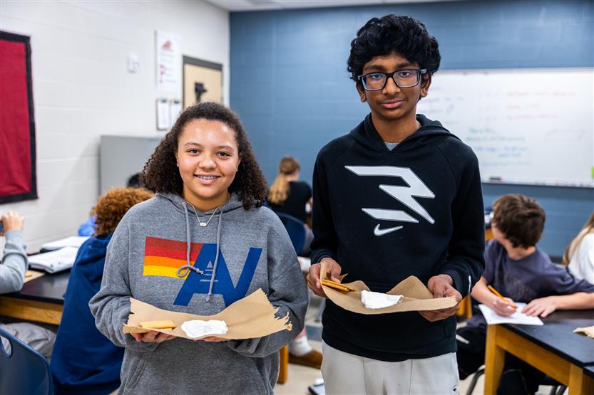Students do a science experiment